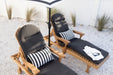 Berlin Gardens Comfo Back Chaise Lounges in Natural Teak. Cushions in Heritage Char. Pillows in Regatta Ebony