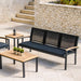 Three Birds Casual Tribeca 3-Seater Settee with other Tribeca pieces in a stone patio space