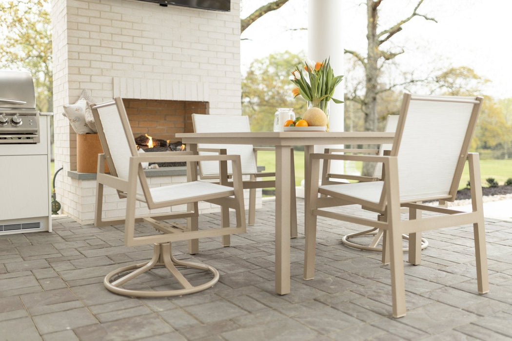 Vida 44” Square Aluminum Dining Table in Sahara Speckle. Vida Sling Dining Chairs and Vida Sling Swivel Rocker Dining Chairs in Sahara Speckle, sling in Kozo Abalone
